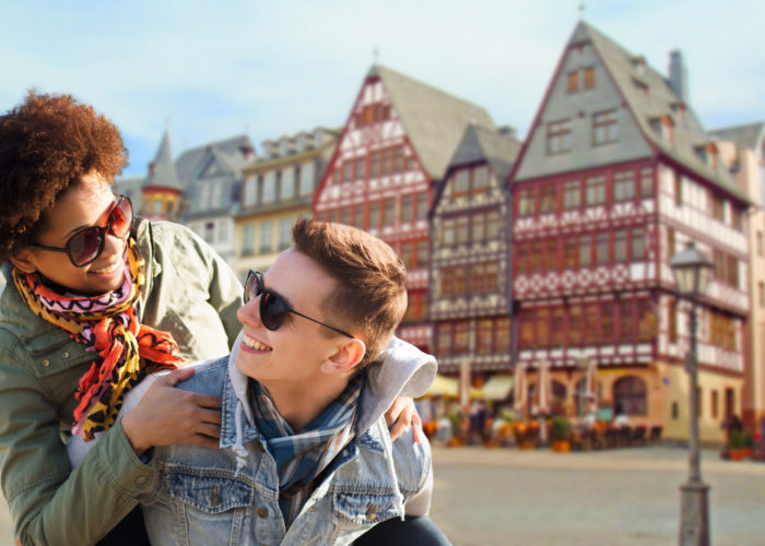 Happy couple laughing together in Frankfurt, Germany