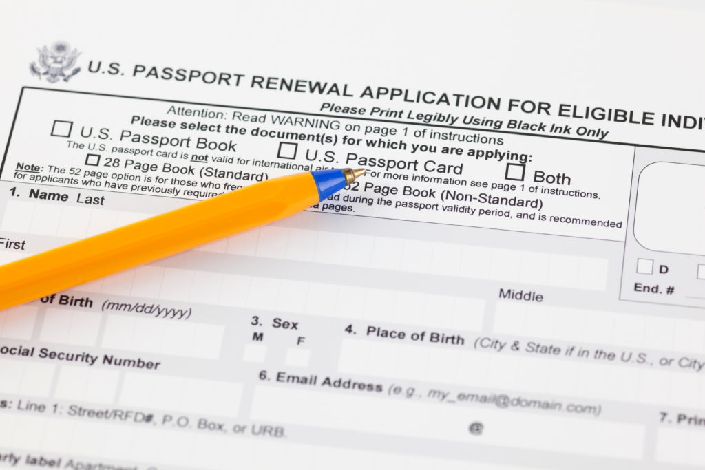 Close up of a US passport renewal form with a pencil on top