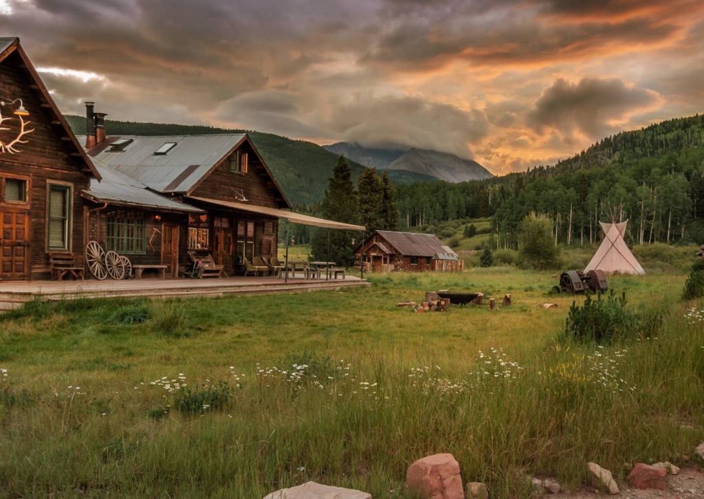 Cabin at sunset at Dunton Hot Springs in Colorado