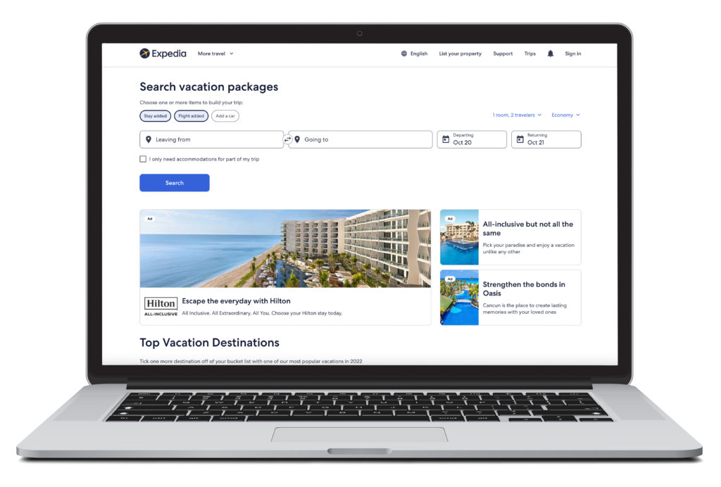 Laptop showing homepage of Expedia vacation packages booking site