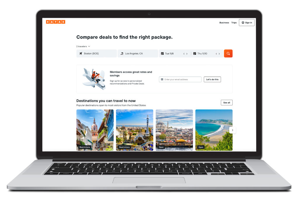 Laptop showing homepage of Kayak vacation packages booking site
