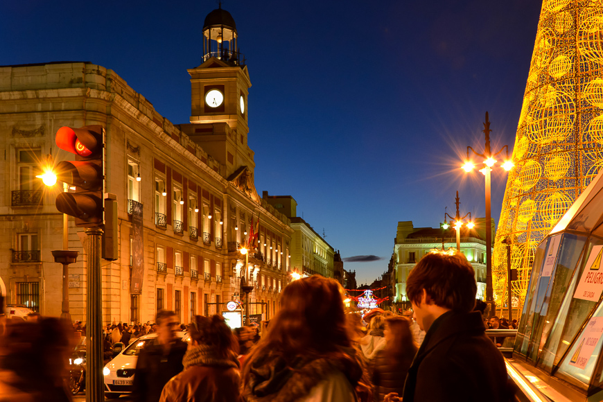 Madrid, Spain-December 8, 2014: New-Year's tree and "House of the Post Office" on square "Puerta del Sol" in Madrid